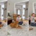Mom Includes Three Curious Golden Retrievers in Baby’s Fun Activity